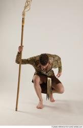 KEETA KNEELING POSE WITH SPEAR